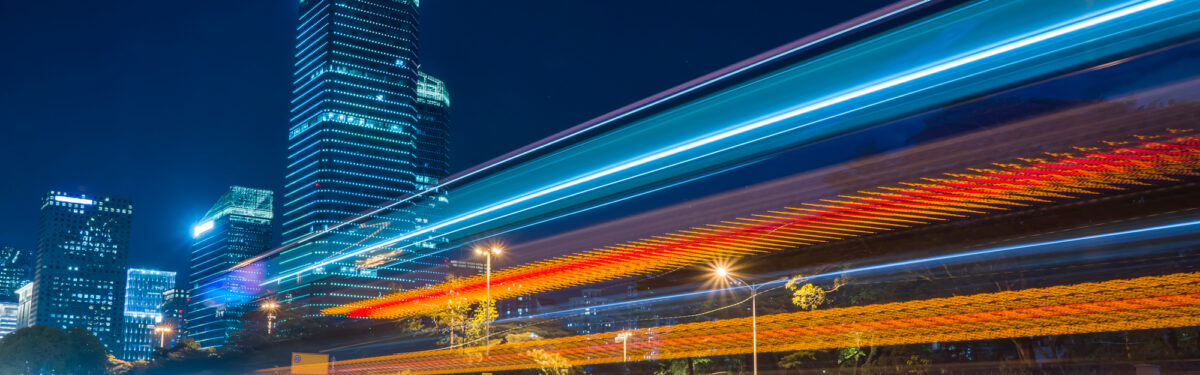 Light rail orange and blue photograph in city